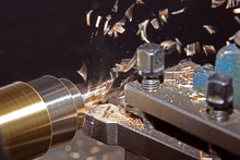 Metal Working On Lathe Grinder Machine With Flying Shavings