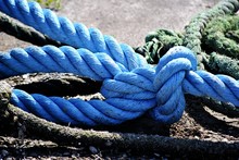Blue Rope With A Knot In The Harbor