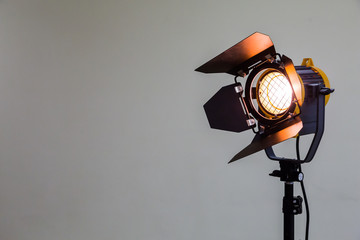spotlight with halogen bulb and fresnel lens. lighting equipment for studio photography or videograp