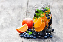 Detox  Organic Blueberry And Orange Drink On Wooden Background