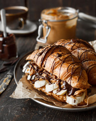 Wall Mural - Croissant with banana, peanut butter and chocolate