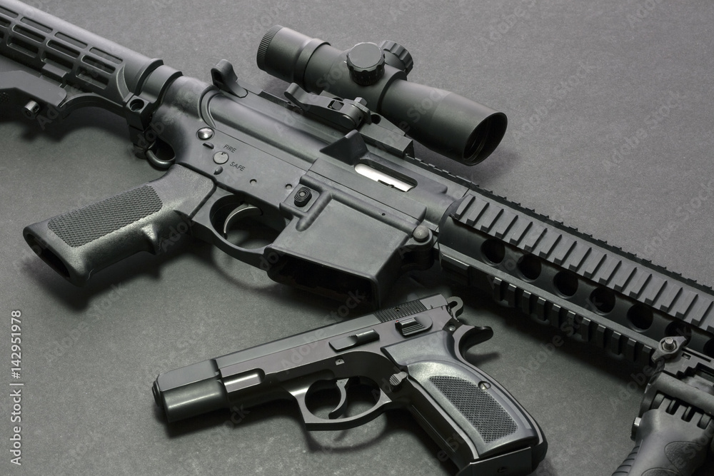 Assault rifle with handgun and ammunition. Military weapon Stock Photo ...