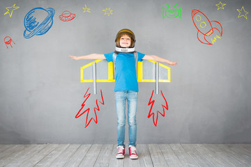 Canvas Print - Kid playing with jet pack at home