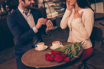 Wall Mural - A man making proposal in a cafe