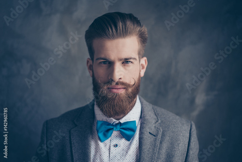 Portrait Of Stylish Hipster Brutal Young Man With Red Mustache