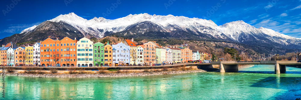 City scape in Innsbruck city center with beautiful houses, river Inn and Tyrolian Alps, Austria, Europe. - obrazy, fototapety, plakaty 