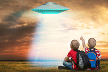Two Younger Brother Looking At The Unidentified Flying Object That Appeared In The Sky.