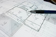© siriporn - Architectural plan on the house plan with a pencil placed on