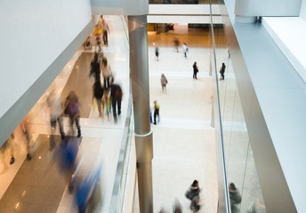 Wall Mural - People rushing in the lobby. motion blur