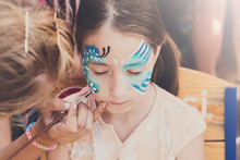 Female Child Face Painting, Making Butterfly Process
