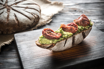 Canvas Print - Sandwich with guacamole and sun-dried tomatoes