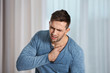 © Africa Studio - Man having a heart attack at home