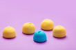 photo of tasty colorful marshmallows on the wonderful purple background