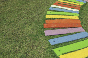 colorful path on grass field background.