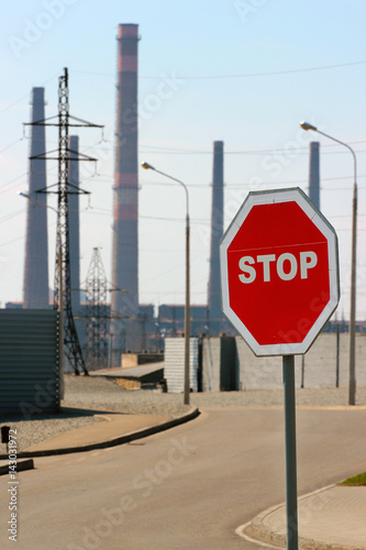 Stop Sign At The Approach Of Industrial Zone Warning Of Dangerous Area Ahead Buy This Stock Photo And Explore Similar Images At Adobe Stock Adobe Stock