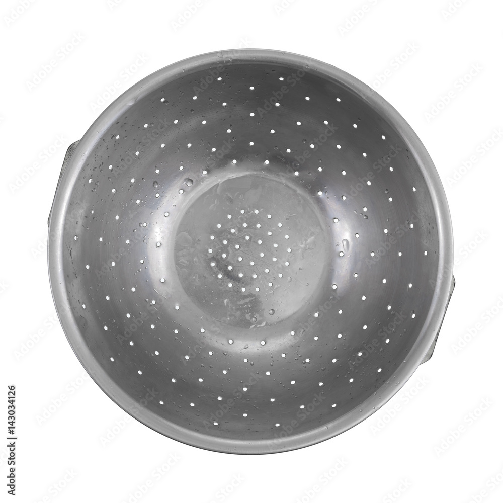 Old stainless steel colander top view isolated on a white background ...