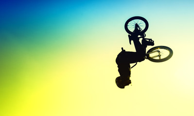 High BMX jump in a skate park.BMX Stunts