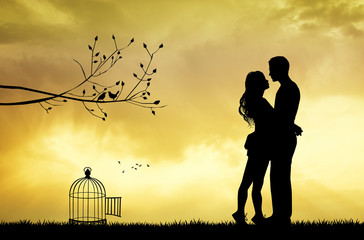 Poster - lovers kissing and bird cage at sunset