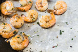 Fototapeta Maki - Grilled Shrimp Dinner On Metal Pan With Salt and Parsley