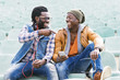 © santypan - Two black race friends having fun.