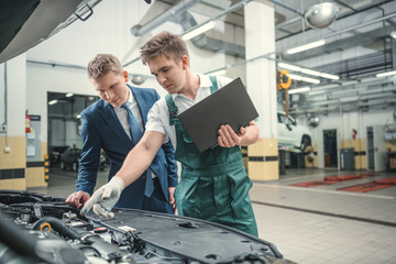 Wall Mural - Mechanic and customer