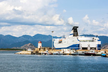Coastline Mountain View Ferry Port Big Harbor On Sardegna Island In Italy