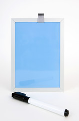 Wall Mural - Blue dry erase board with pen in foreground. Vertical.