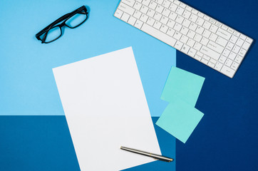Leinwandbilder - Mock-up magazine or catalog on colorful table. White page or notepad on modern background. Blank copy space for mockups or simulations.
