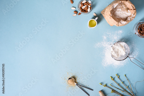 Fotografía Baking ingredients for pastry on the blue background