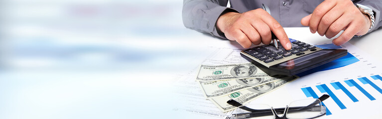 Fototapete - Accountant hands with calculator