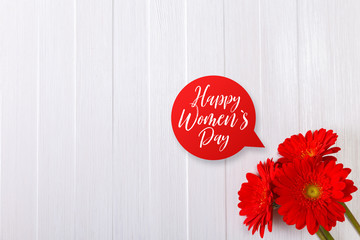 Wall Mural - Gerbera flowers on white wood vintage background. Happy Womens day speech bubble. 8 march or Valentines day love design. Painted wooden planks.