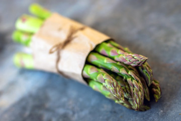 Wall Mural - Asparagus on rustic wooden background