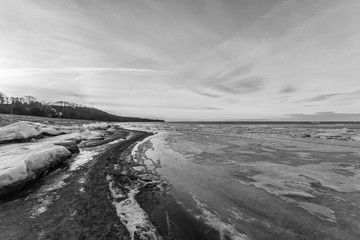 Wall Mural -  Winter landscape. Coast line. Sea covered blocks of ice.