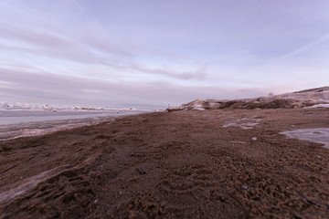 Wall Mural -  Winter landscape. Coast line. Sea covered blocks of ice.