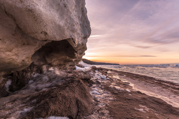 Wall Mural - Winter landscape. Coast line. Sea covered blocks of ice.