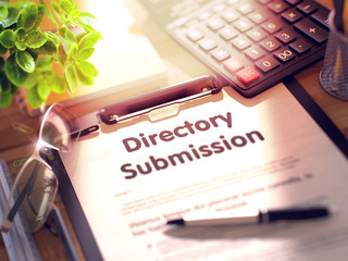 Poster - Directory Submission on Clipboard. Composition with Clipboard on Working Table and Office Supplies Around. 3d Rendering. Blurred Image.