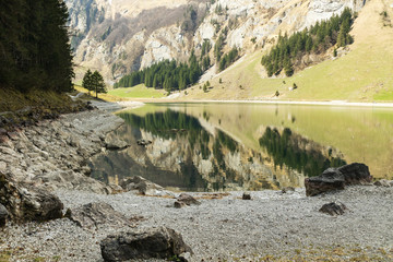 Leinwandbilder - Tranquil scene of lake of seealpsee reflecting the mountain in Alpstein, Switzerland