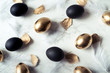 Background of black and gold eggs style minimalism
