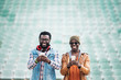 © santypan - Two black race friends having fun.