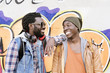 © santypan - Two black race friends having fun.