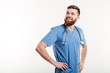 © Drobot Dean - Portrait of a young smiling positive man doctor with stethoscope