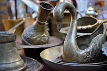 Antique Objects Displayed On Flea Market.