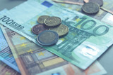 Fototapeta Młodzieżowe - Money euro banknotes and coins - green tone