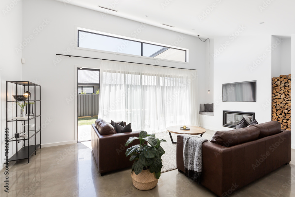 Modern open plan luxury living room with glass sliding doors Stock ...