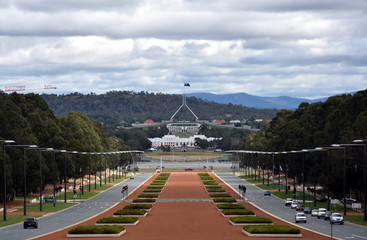 Wall Mural - Canberra, Australia - March 18, 2017. Anzac Parade running from The Australian War Memorial in direction of Parliament House, Canberra. View of Anzac Parade and Parliament House in Canberra, Australia