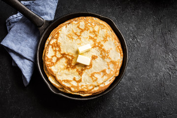 Wall Mural - crepes in cast iron pan