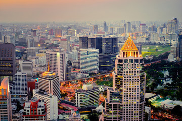 Sticker - Evening in megapolis. Beautiful cityscape with top view on skyscrapers. Bangkok, Thailand.