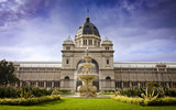 Fototapeta  - Royal Exhibition Building behind Carlton Gardens in Melbourne, Victoria, Australia. First building in Oz to be awarded UNESCO world heritage status. One of last remaining 19thC exhibition buildings.