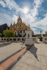 Wat Ratchanatdaram a Beautiful temple at daytime, the temple is best known for the Loha Prasat famous landmark for tourist in Bangkok,Thailand