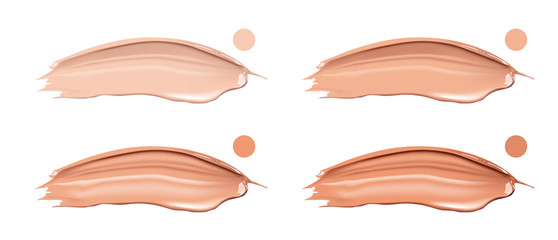 Cosmetic liquid foundation cream set in different colour smudge smear strokes. Make up smears isolated on white background.